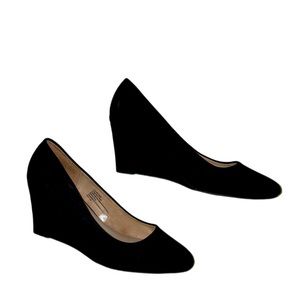 Comfortable and stylish black wedge heels